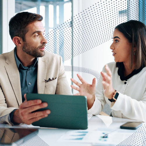 People discuss information from a tablet