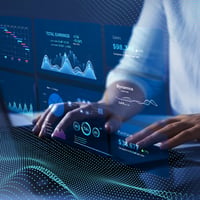 User on a computer screen analyzing market data