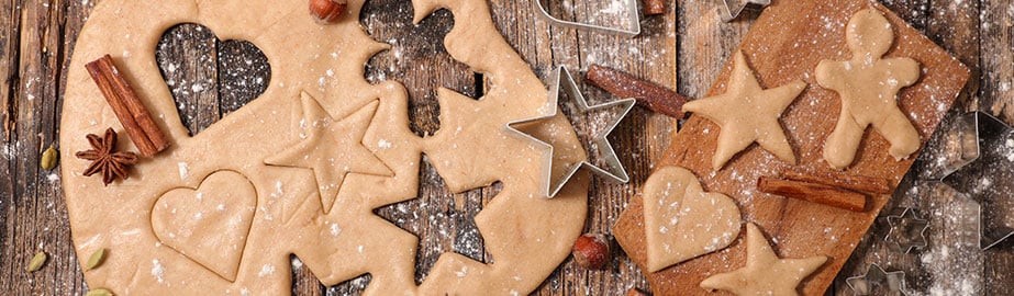 Cookies and spices next to rolling pin