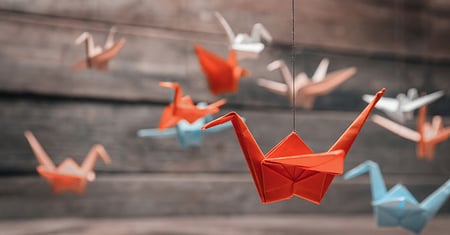 orange and turquoise origami cranes