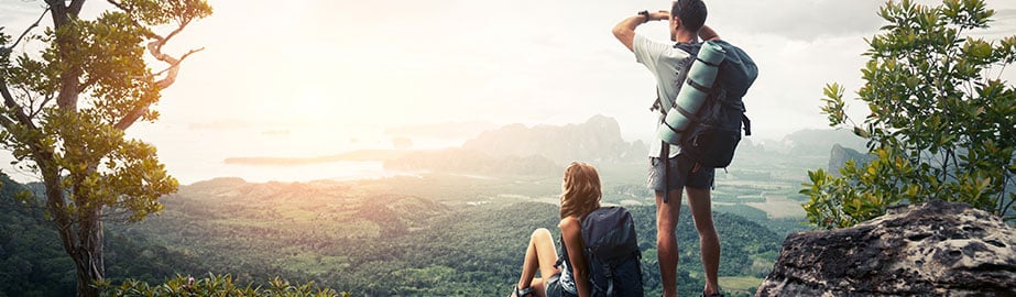 Hikers look over valley