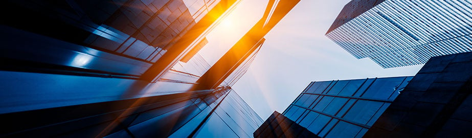 Sunlight reflected on side of modern skyscrapers