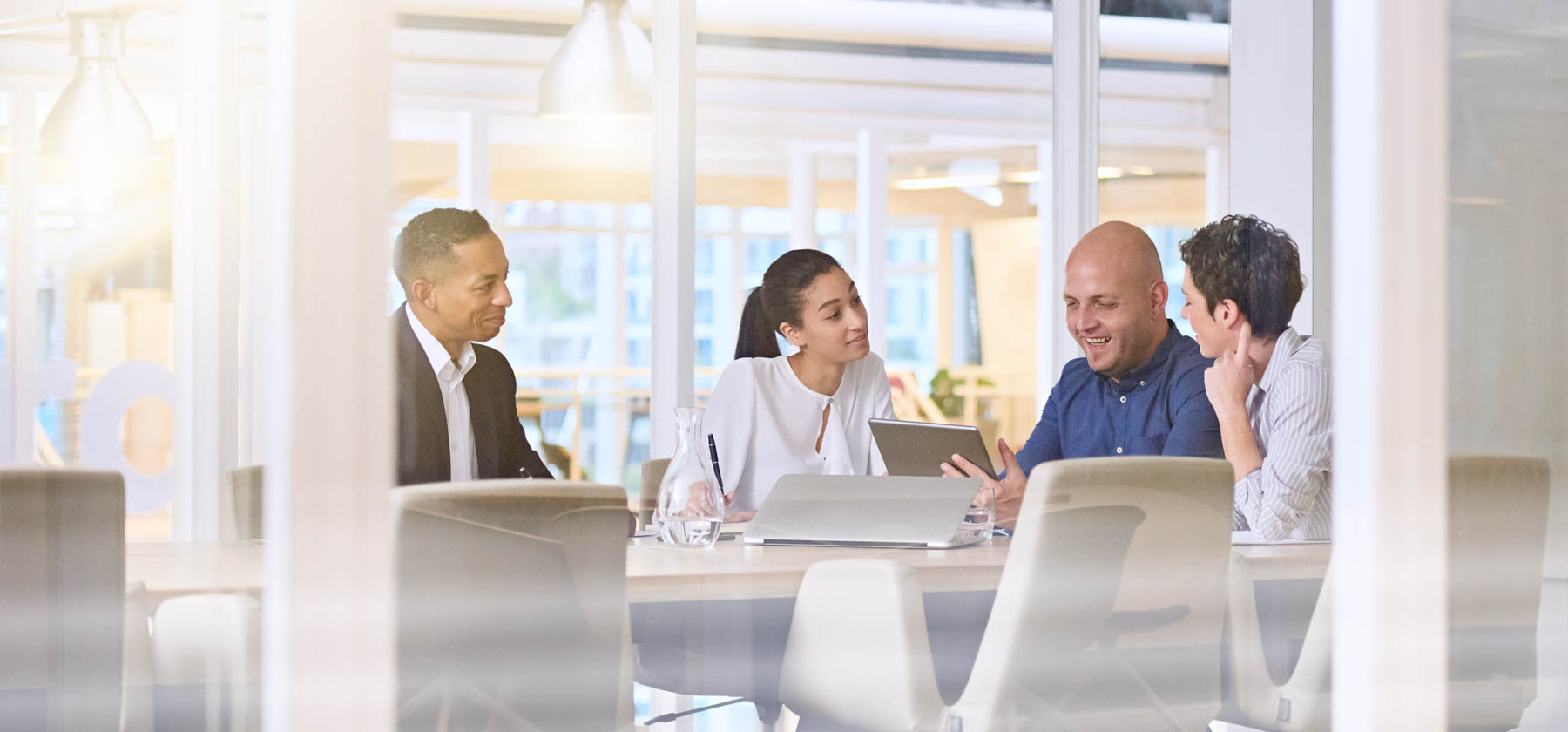 Team in discussion in a meeting room