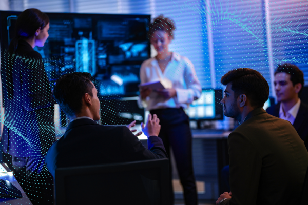 A team of analysts discussing data 